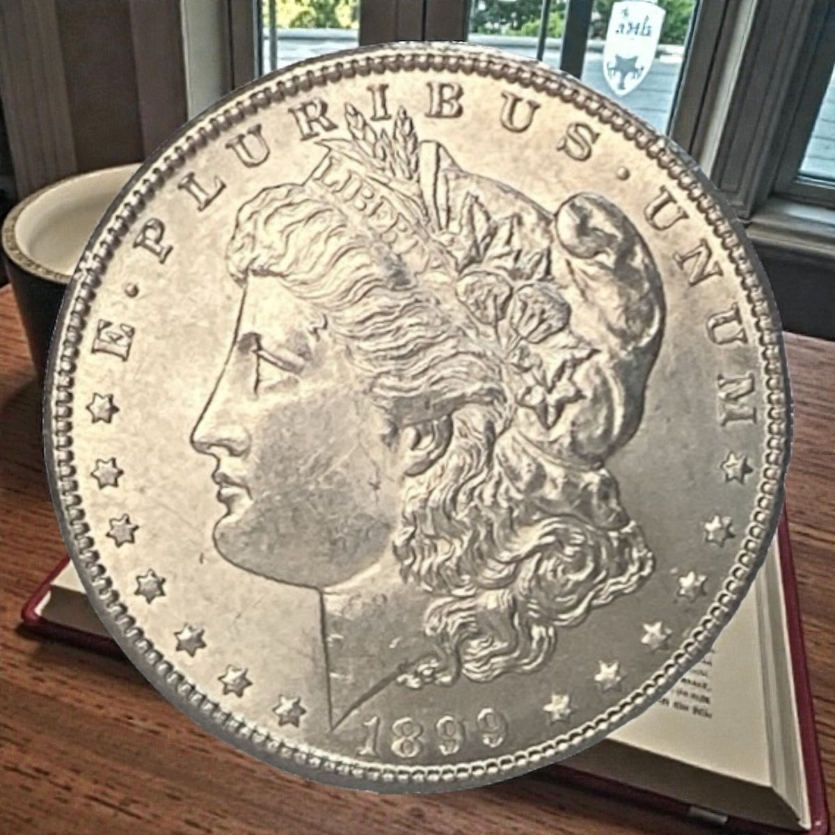 1899-O Morgan Silver Dollar About Uncirculated